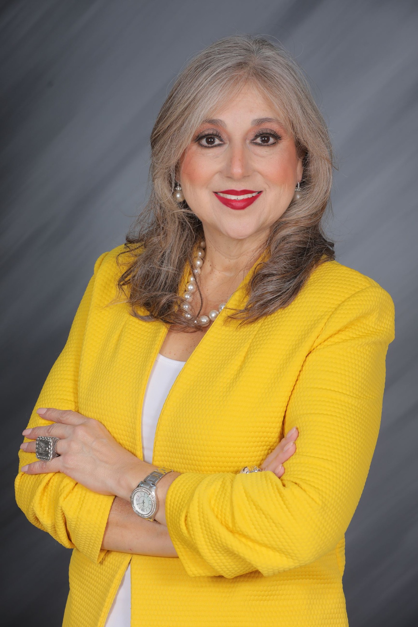 Mrs. Ellie Torres in a professional portrait