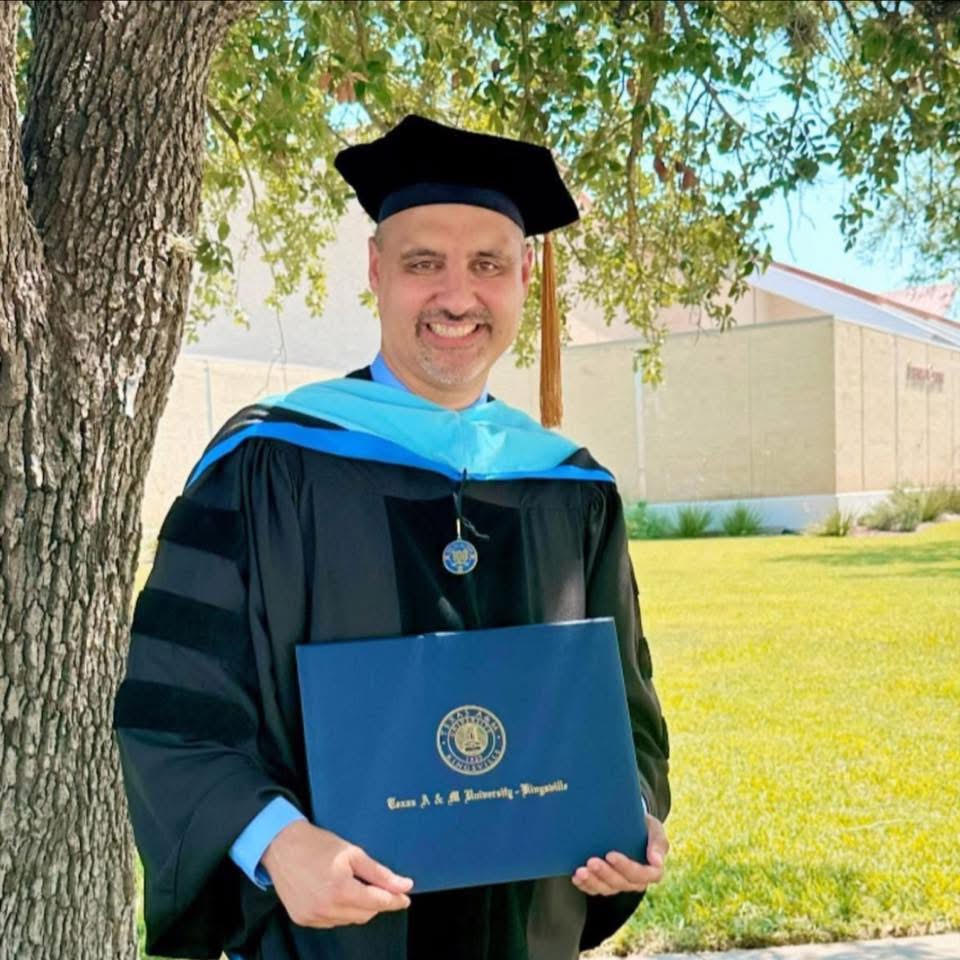 Dr. Jose Alberto Garza in doctoral academic regalia